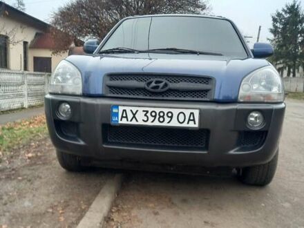 Синий Хендай Туксон, объемом двигателя 2 л и пробегом 170 тыс. км за 8500 $, фото 1 на Automoto.ua