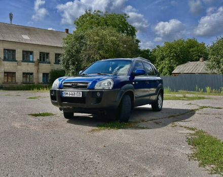 Синий Хендай Туксон, объемом двигателя 1.98 л и пробегом 220 тыс. км за 8000 $, фото 1 на Automoto.ua