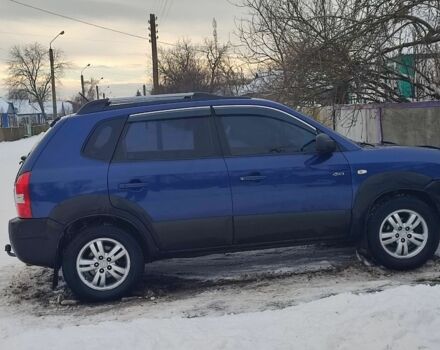 Синий Хендай Туксон, объемом двигателя 2 л и пробегом 288 тыс. км за 7800 $, фото 1 на Automoto.ua