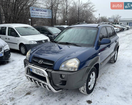 Синій Хендай Туксон, об'ємом двигуна 1.98 л та пробігом 190 тис. км за 7990 $, фото 1 на Automoto.ua