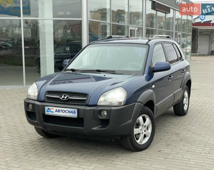 Синий Хендай Туксон, объемом двигателя 1.98 л и пробегом 163 тыс. км за 8000 $, фото 1 на Automoto.ua