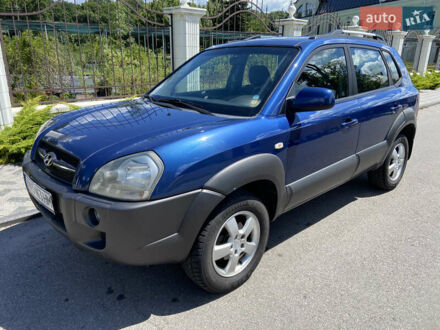 Синий Хендай Туксон, объемом двигателя 2 л и пробегом 233 тыс. км за 7300 $, фото 1 на Automoto.ua