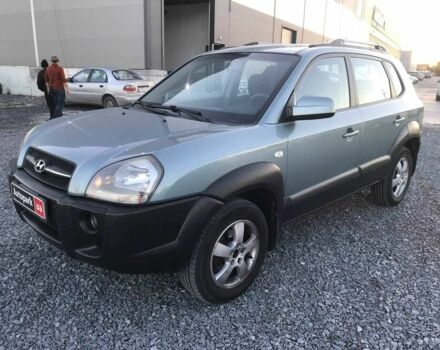 Синий Хендай Туксон, объемом двигателя 2 л и пробегом 207 тыс. км за 6890 $, фото 1 на Automoto.ua