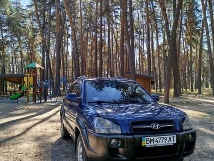Синий Хендай Туксон, объемом двигателя 1.98 л и пробегом 267 тыс. км за 7300 $, фото 1 на Automoto.ua
