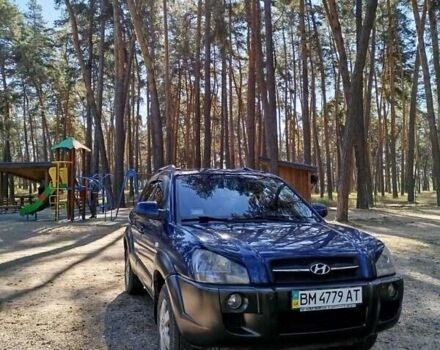 Синий Хендай Туксон, объемом двигателя 1.98 л и пробегом 267 тыс. км за 7300 $, фото 1 на Automoto.ua