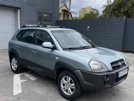 Синий Хендай Туксон, объемом двигателя 1.98 л и пробегом 213 тыс. км за 7500 $, фото 1 на Automoto.ua