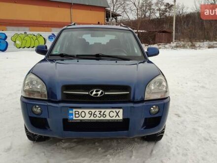 Синий Хендай Туксон, объемом двигателя 1.98 л и пробегом 228 тыс. км за 7700 $, фото 1 на Automoto.ua