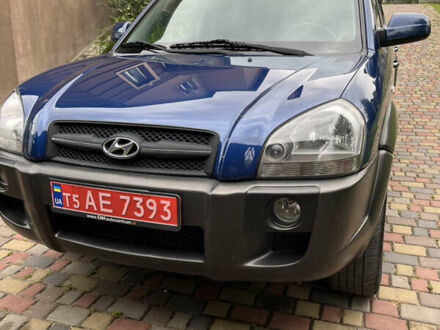 Синий Хендай Туксон, объемом двигателя 1.98 л и пробегом 230 тыс. км за 6555 $, фото 1 на Automoto.ua