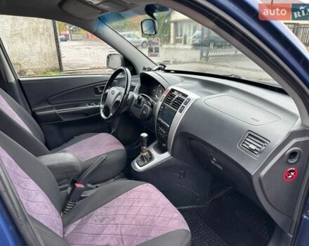 Синий Хендай Туксон, объемом двигателя 1.98 л и пробегом 227 тыс. км за 8200 $, фото 1 на Automoto.ua