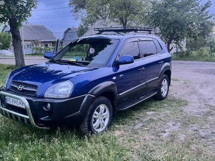 Синій Хендай Туксон, об'ємом двигуна 2 л та пробігом 115 тис. км за 9500 $, фото 1 на Automoto.ua