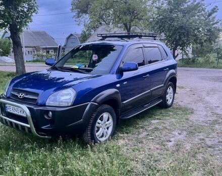 Синий Хендай Туксон, объемом двигателя 2 л и пробегом 115 тыс. км за 9500 $, фото 1 на Automoto.ua