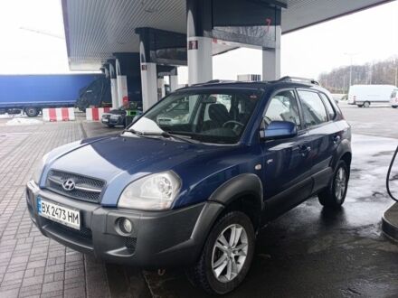 Синий Хендай Туксон, объемом двигателя 2 л и пробегом 156 тыс. км за 6850 $, фото 1 на Automoto.ua