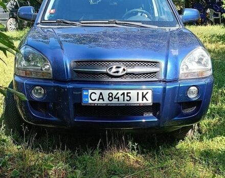 Синій Хендай Туксон, об'ємом двигуна 1.98 л та пробігом 243 тис. км за 7950 $, фото 1 на Automoto.ua