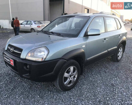 Синий Хендай Туксон, объемом двигателя 2 л и пробегом 207 тыс. км за 7990 $, фото 1 на Automoto.ua