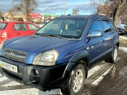 Синий Хендай Туксон, объемом двигателя 1.98 л и пробегом 292 тыс. км за 7500 $, фото 1 на Automoto.ua