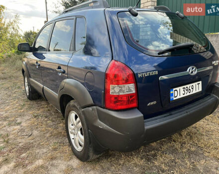 Синий Хендай Туксон, объемом двигателя 1.98 л и пробегом 210 тыс. км за 4500 $, фото 1 на Automoto.ua