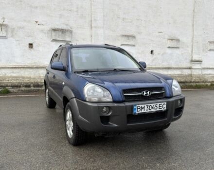 Синій Хендай Туксон, об'ємом двигуна 2 л та пробігом 253 тис. км за 7699 $, фото 1 на Automoto.ua