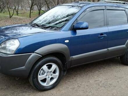 Синий Хендай Туксон, объемом двигателя 1.98 л и пробегом 279 тыс. км за 7900 $, фото 1 на Automoto.ua