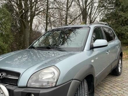 Синий Хендай Туксон, объемом двигателя 1.98 л и пробегом 168 тыс. км за 8500 $, фото 1 на Automoto.ua