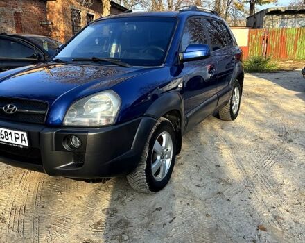 Синий Хендай Туксон, объемом двигателя 2 л и пробегом 208 тыс. км за 6700 $, фото 1 на Automoto.ua