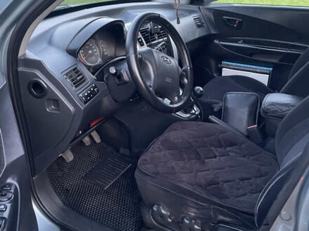 Синий Хендай Туксон, объемом двигателя 1.98 л и пробегом 260 тыс. км за 8000 $, фото 1 на Automoto.ua