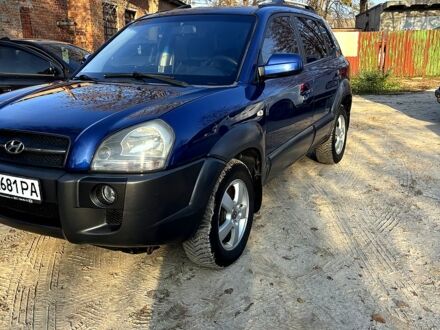 Синий Хендай Туксон, объемом двигателя 2 л и пробегом 208 тыс. км за 6700 $, фото 1 на Automoto.ua
