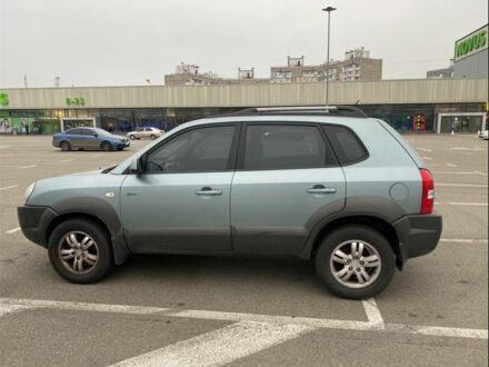 Синий Хендай Туксон, объемом двигателя 2 л и пробегом 179 тыс. км за 6500 $, фото 1 на Automoto.ua
