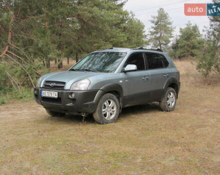 Синий Хендай Туксон, объемом двигателя 1.97 л и пробегом 195 тыс. км за 8000 $, фото 1 на Automoto.ua