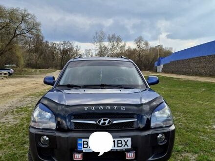 Синий Хендай Туксон, объемом двигателя 2 л и пробегом 223 тыс. км за 7199 $, фото 1 на Automoto.ua
