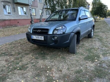 Синий Хендай Туксон, объемом двигателя 2 л и пробегом 160 тыс. км за 9001 $, фото 1 на Automoto.ua