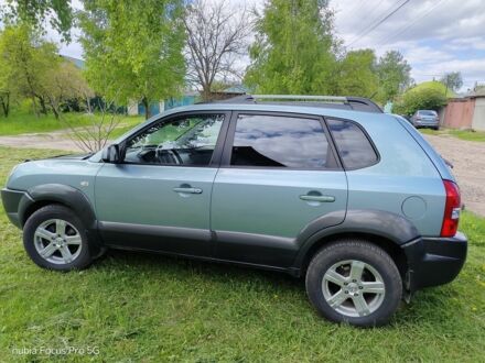 Синий Хендай Туксон, объемом двигателя 2 л и пробегом 188 тыс. км за 8000 $, фото 1 на Automoto.ua