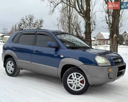 Синий Хендай Туксон, объемом двигателя 2 л и пробегом 175 тыс. км за 7998 $, фото 1 на Automoto.ua