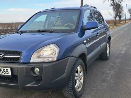 Синий Хендай Туксон, объемом двигателя 2 л и пробегом 209 тыс. км за 3900 $, фото 1 на Automoto.ua