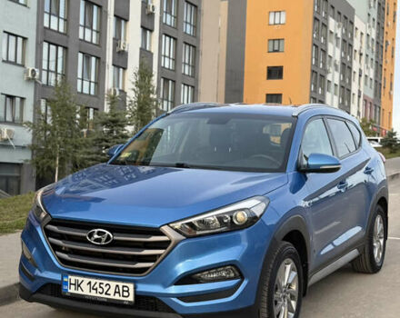 Синий Хендай Туксон, объемом двигателя 2 л и пробегом 73 тыс. км за 17000 $, фото 1 на Automoto.ua
