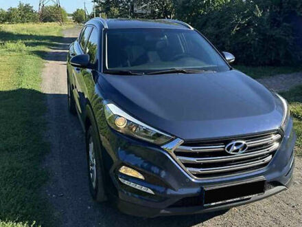 Синий Хендай Туксон, объемом двигателя 2 л и пробегом 90 тыс. км за 21500 $, фото 1 на Automoto.ua