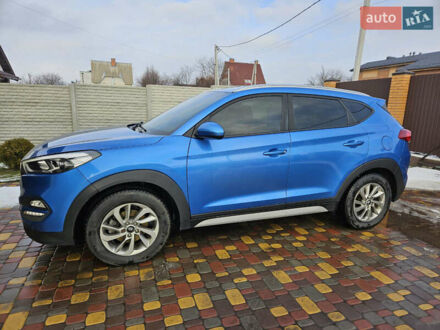 Синий Хендай Туксон, объемом двигателя 2 л и пробегом 150 тыс. км за 17999 $, фото 1 на Automoto.ua