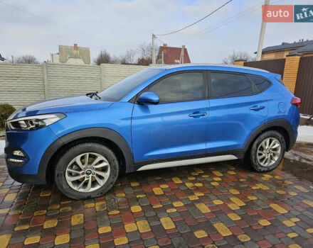 Синий Хендай Туксон, объемом двигателя 2 л и пробегом 150 тыс. км за 17999 $, фото 1 на Automoto.ua