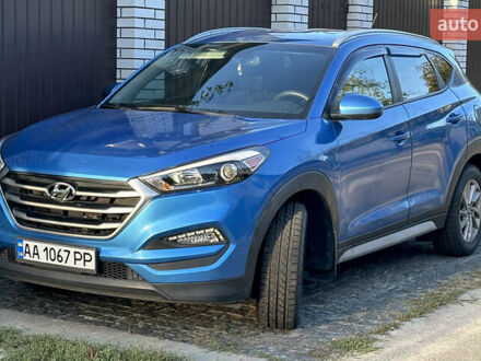 Синий Хендай Туксон, объемом двигателя 2 л и пробегом 37 тыс. км за 17500 $, фото 1 на Automoto.ua
