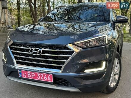 Синий Хендай Туксон, объемом двигателя 1.6 л и пробегом 134 тыс. км за 21495 $, фото 1 на Automoto.ua