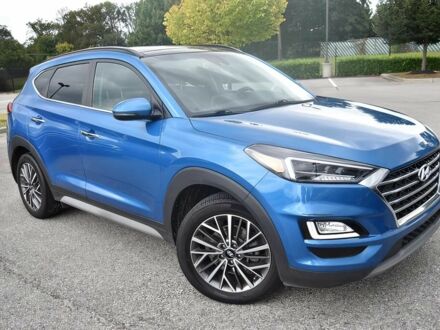 Синий Хендай Туксон, объемом двигателя 2.4 л и пробегом 23 тыс. км за 11000 $, фото 1 на Automoto.ua