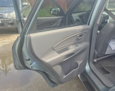 Зеленый Хендай Туксон, объемом двигателя 2 л и пробегом 190 тыс. км за 5000 $, фото 19 на Automoto.ua