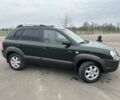 Зеленый Хендай Туксон, объемом двигателя 2 л и пробегом 195 тыс. км за 5000 $, фото 2 на Automoto.ua