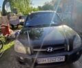 Зеленый Хендай Туксон, объемом двигателя 2 л и пробегом 250 тыс. км за 8500 $, фото 1 на Automoto.ua