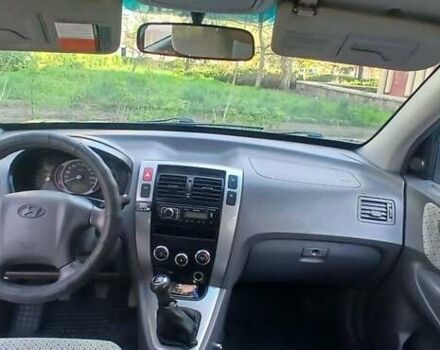 Зеленый Хендай Туксон, объемом двигателя 1.98 л и пробегом 288 тыс. км за 6500 $, фото 14 на Automoto.ua