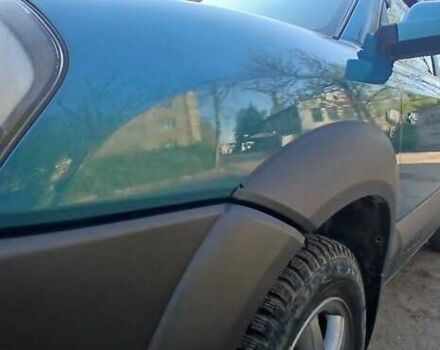 Зеленый Хендай Туксон, объемом двигателя 1.98 л и пробегом 288 тыс. км за 6500 $, фото 9 на Automoto.ua