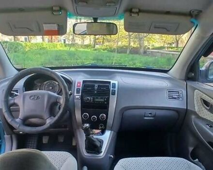 Зеленый Хендай Туксон, объемом двигателя 1.98 л и пробегом 288 тыс. км за 6500 $, фото 10 на Automoto.ua