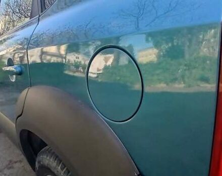 Зеленый Хендай Туксон, объемом двигателя 1.98 л и пробегом 288 тыс. км за 6500 $, фото 11 на Automoto.ua