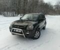 Зеленый Хендай Туксон, объемом двигателя 2 л и пробегом 309 тыс. км за 3728 $, фото 1 на Automoto.ua