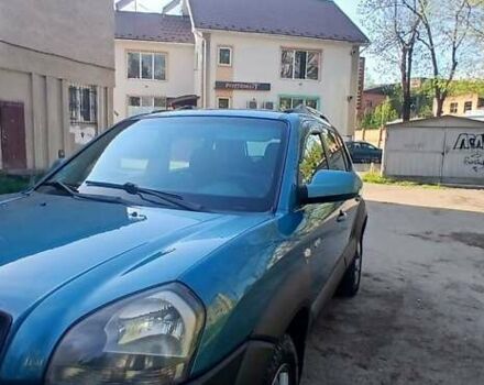 Зеленый Хендай Туксон, объемом двигателя 1.98 л и пробегом 288 тыс. км за 6500 $, фото 6 на Automoto.ua