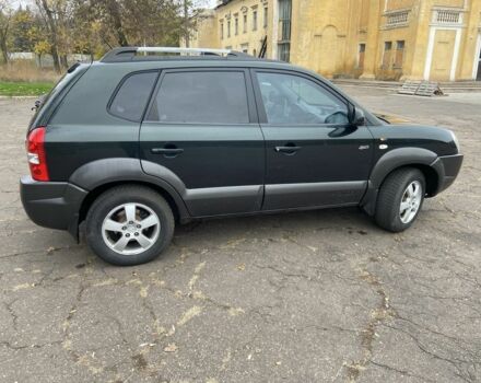 Зеленый Хендай Туксон, объемом двигателя 2 л и пробегом 200 тыс. км за 8500 $, фото 7 на Automoto.ua